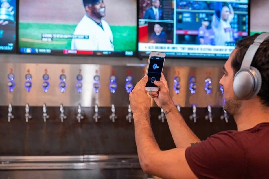 How to listen to muted TVs in bars and at the gym using your phone